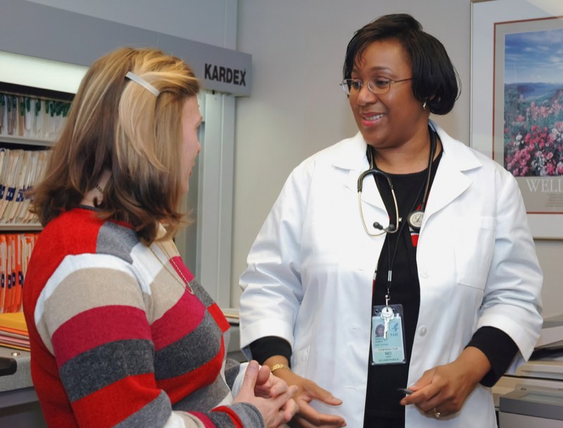Doctor talking with a patient during a check-up